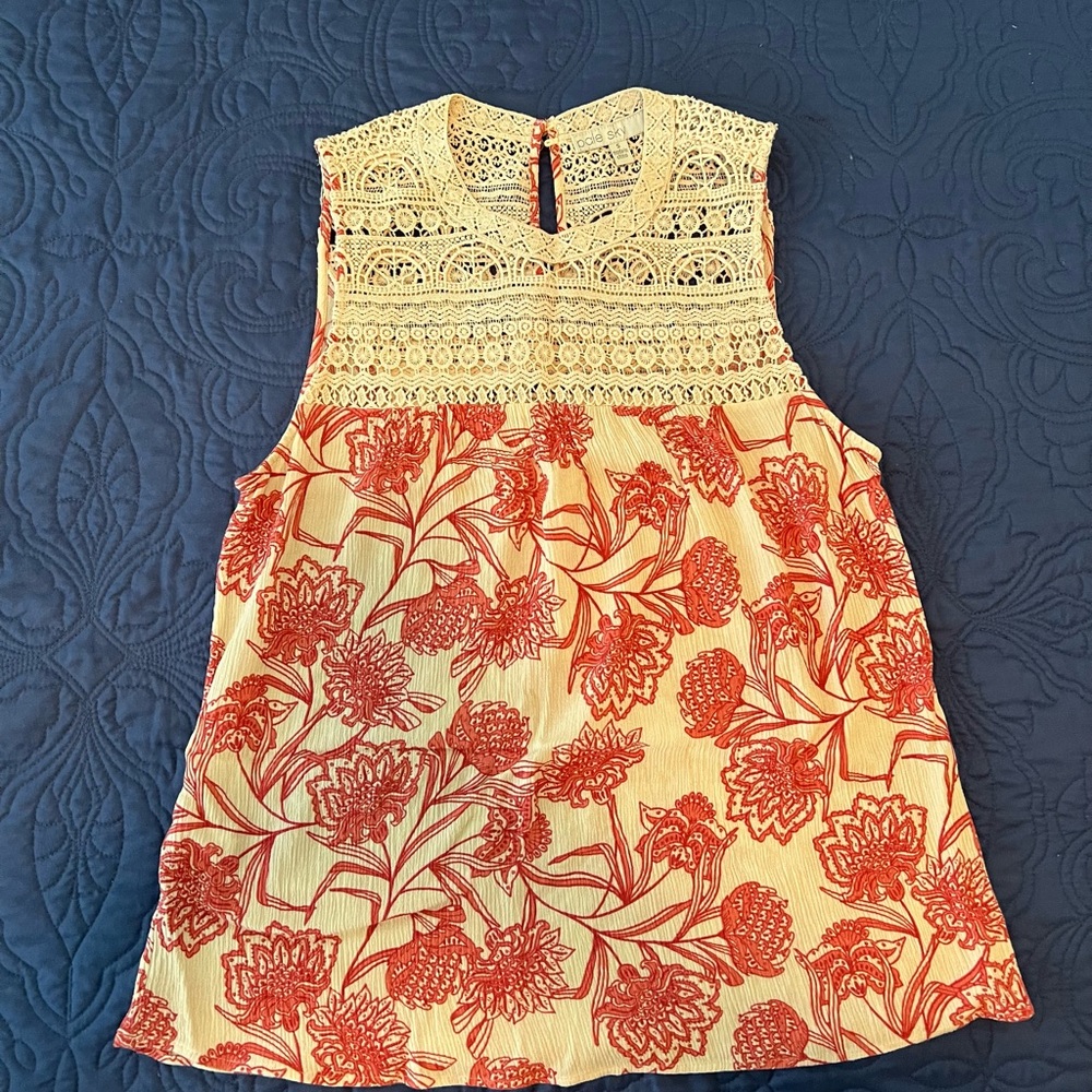 Pale Sky Sleeveless Blouse